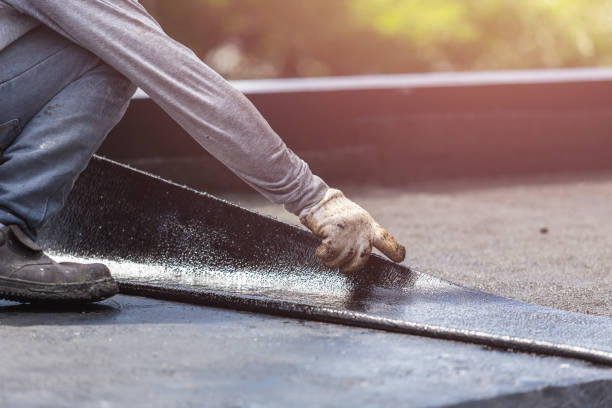 Professional Interior Drainage System technician working in Dayton, KY